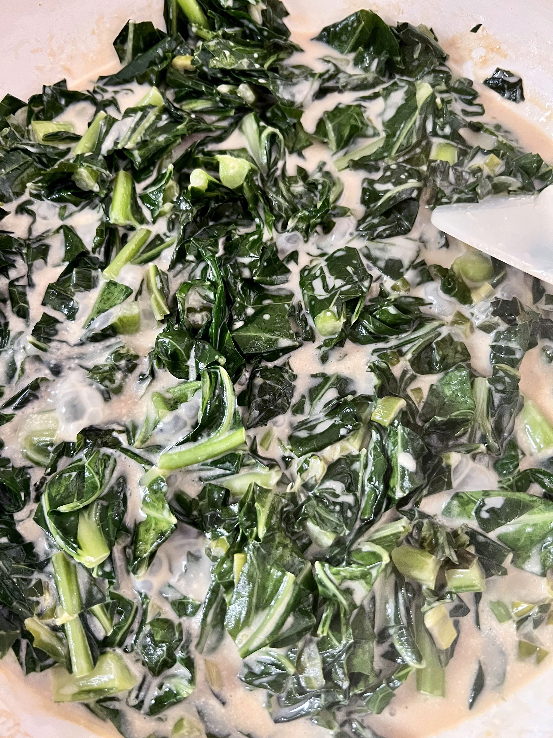 Coconut Braised Collards with Butter Baked Tilapia » Djalali Cooks
